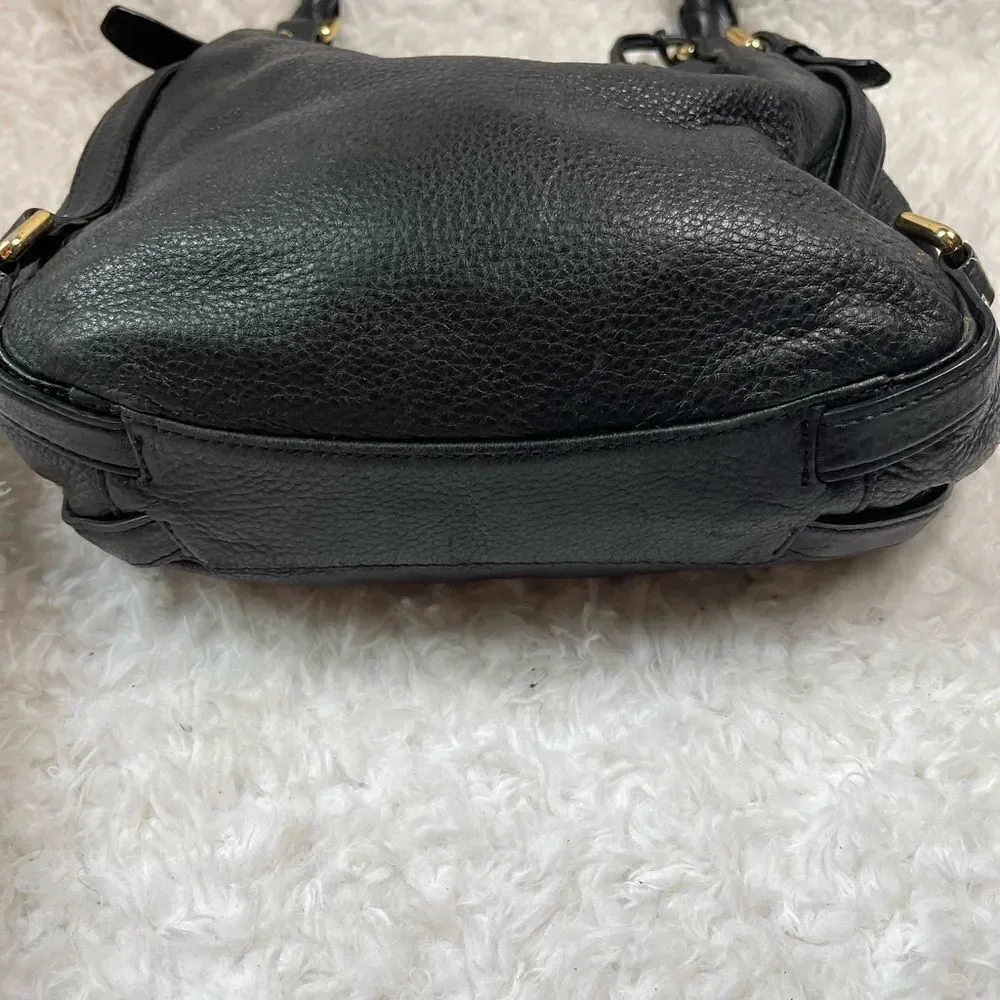 Michael Kors Black Pebble Leather Satchel with gold tone hardwares and accents.